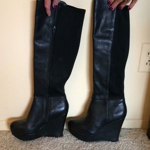Aldo Black knee high leather boots.